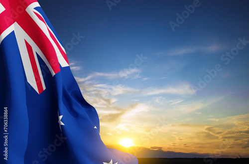 Flag of Australia against the sunset. Australia Day background photo