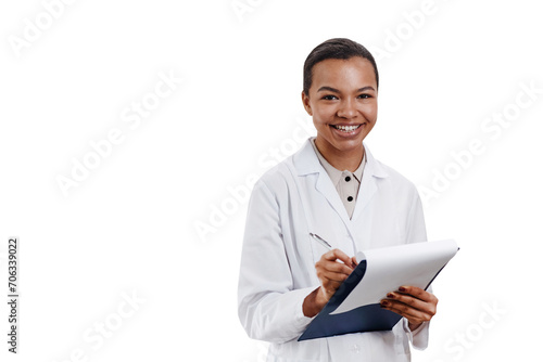 Waist up shot of cheerful young African American scientist holding pen and clipboard while looking at camera isolated on white background photo