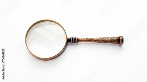 Bronze ornamented magnifying glass isolated on a white background.