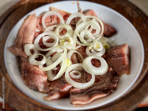 salted herring with white onion