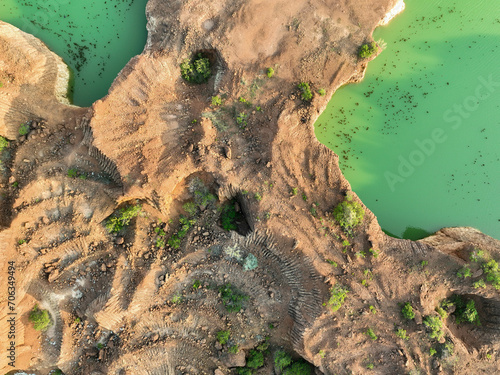 Aerial view of a waterbody in a forest photo