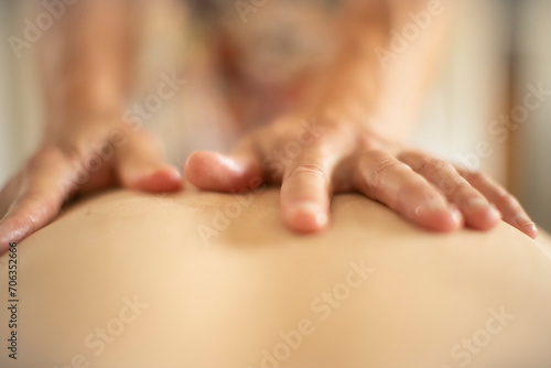 Close up massage therapist massaging back
 photo