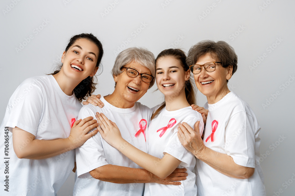 Smiling women with pink satin ribbon Smiling women with pink satin ribbon
