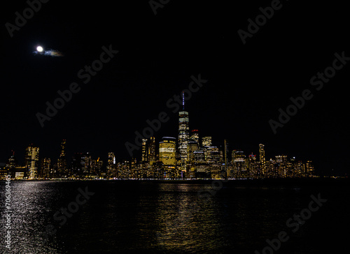 Stunning view of the New York City skyline at night  beautifully illuminated by lights