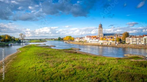 Scenic view of the town of Deventer along a river in the Netherlands photo