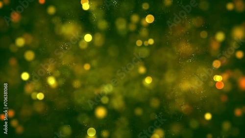 Dynamic video background of shimmering golden polka dots on blurred green Christmas tree festive background, dynamic video background of sparkling golden polka dots, dynamic video background of festiv photo