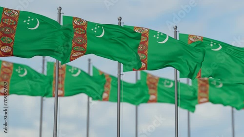 Turkmenistan many flags waving together in the wind, seamless looped video photo