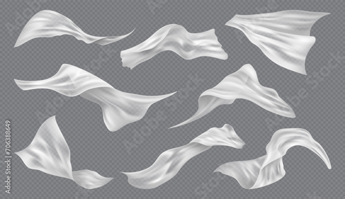 Flying white silk fabric, isolated on transparent background. Vector light fabric blown away by wind or breeze. Billowing curtain or tissue, chiffon cloth, satin clothes, scarf or capes photo