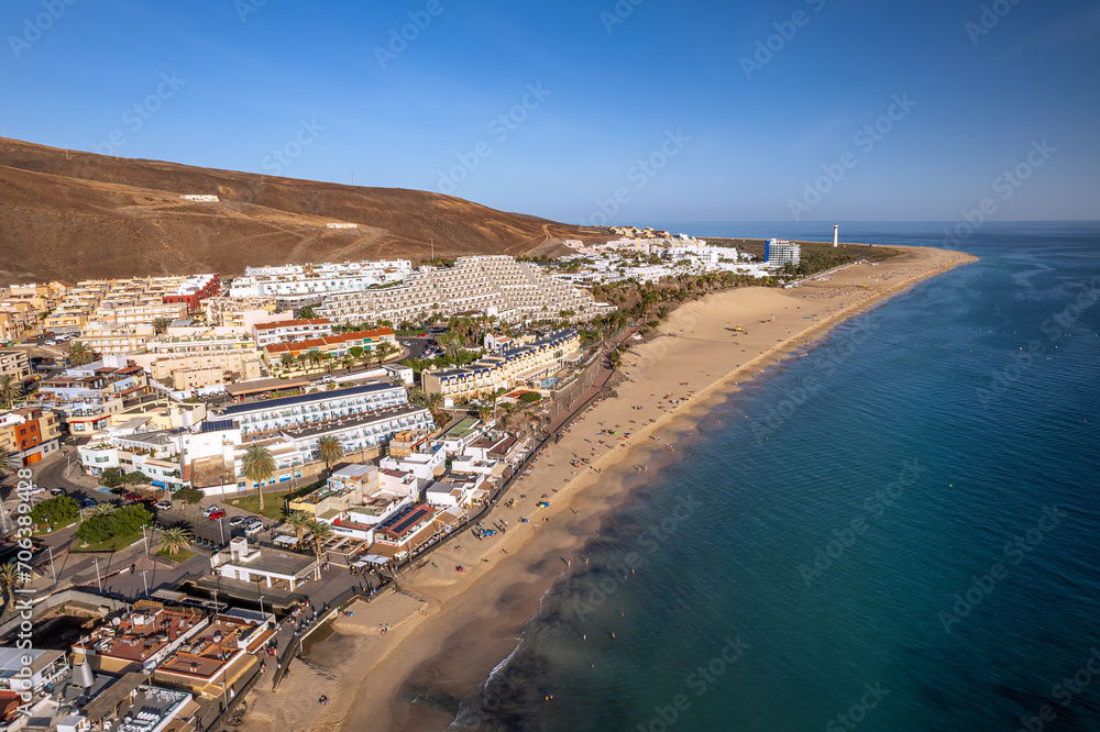 The drone aerial view of Morro Jable and Playa del Matorral in Fuerteventura Island, Spain. Morro Jable is the most populated town in the municipality of Pájara in the south of Fuerteventura.