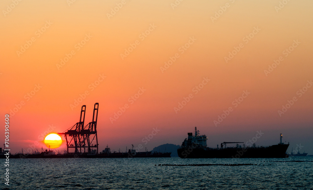 Silhouette of a cargo port image , Cargo ports are facilities that are used to load and unload cargo from ships