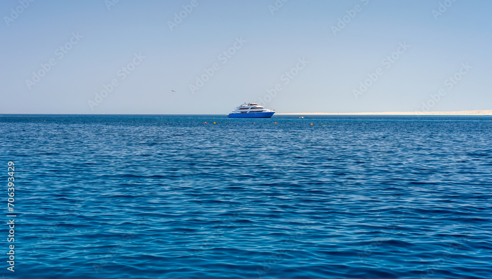 pleasure boat in the blue water of the Red Sea in Egypt