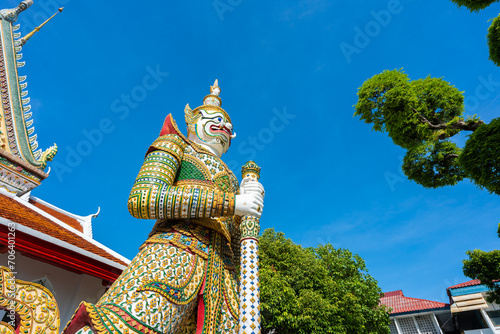 Gates to Ordination Hall with statues of Giants, demon guardians at Wat Arun photo