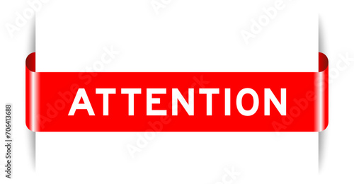Red color inserted label banner with word attention on white background