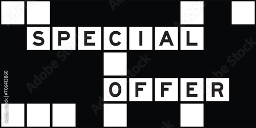 Alphabet letter in word special offer on crossword puzzle background