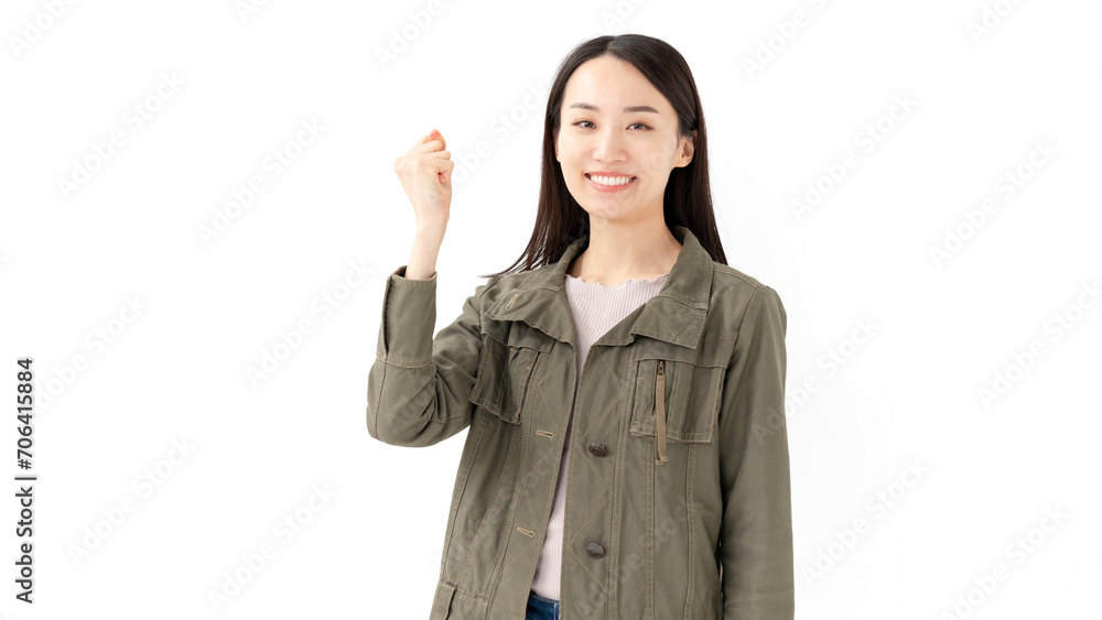 ガッツポーズの若い女性 ガッツポーズの若い女性