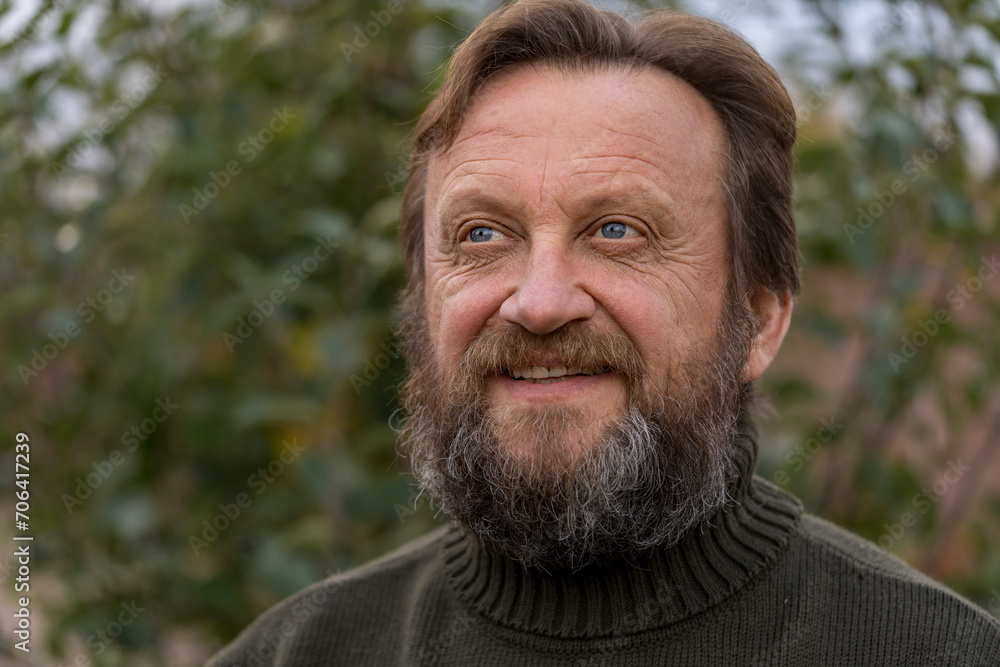 Portrait of a thinking or dreaming or solve problems senior man. Elderly bearded caucasian male in nature. Face bearded male daydream of decision, planning solution and insight of questions Portrait of a thinking or dreaming or solve problems senior man. Elderly bearded caucasian male in nature. Face bearded male daydream of decision, planning solution and insight of questions