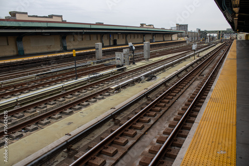 Bustling train station with a set of railroad tracks in New York, United States
