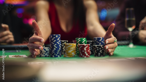 Poker Game in Casino: Betting All in Chips at the Poker Table. In the Blurred Background, Anonymous Players Revealing Their Cards and Winner. Glamorous Gambling Enthusiasts Enjoying Win. 