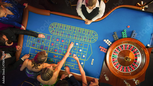Fotografie Top Down View: Luxurious Casino Male and Female Guests Putting Betting Chips on