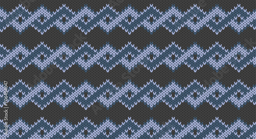 Blue zigzag on grey knitted pattern, Festive Sweater Design. Seamless Knitted Pattern