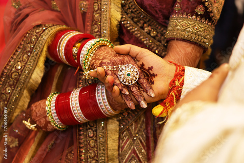 Bride groom holding each other hand, indian wedding