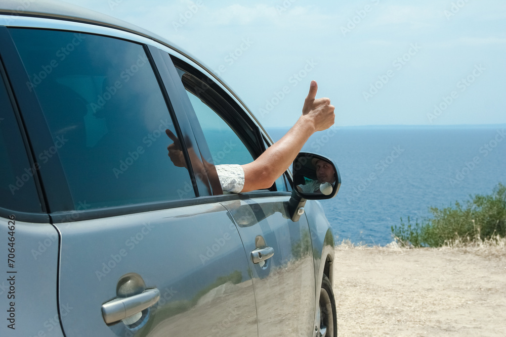 A happy guy in auto sea background A happy guy in auto sea background