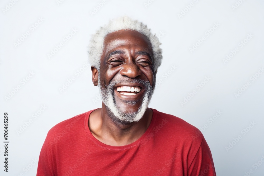 professional portrait studio photo of a handsome old afro american tatooed man model with perfect clean teeth laughing and smiling. isolated on white background. for ads and web design professional portrait studio photo of a handsome old afro american tatooed man model with perfect clean teeth laughing and smiling. isolated on white background. for ads and web design