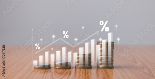 Interest rate concept, bank interest, money with up arrow and percentage symbol for financial banking increase interest rate or mortgage investment dividend from business growth concept, coins stack. photo
