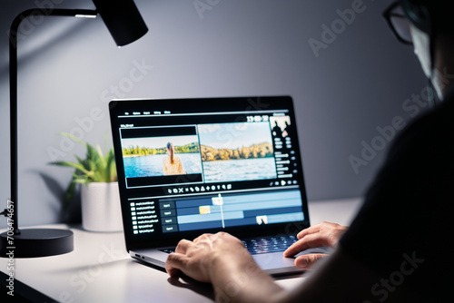 Video edit and film making with editor. Content production. Man editing movie with computer software. Videographer, director or filmmaker working with laptop. Digital montage maker. Special effects. photo