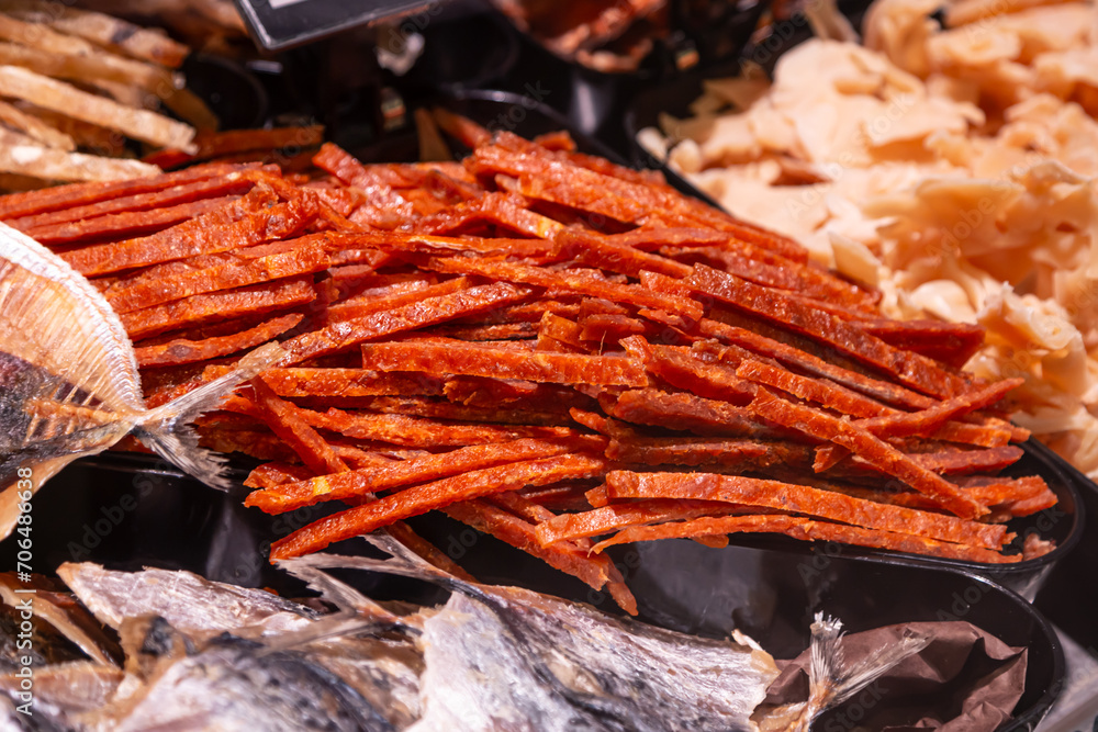 Dried fish on a supermarket display. Beer snack. Dried fish on a supermarket display. Beer snack.