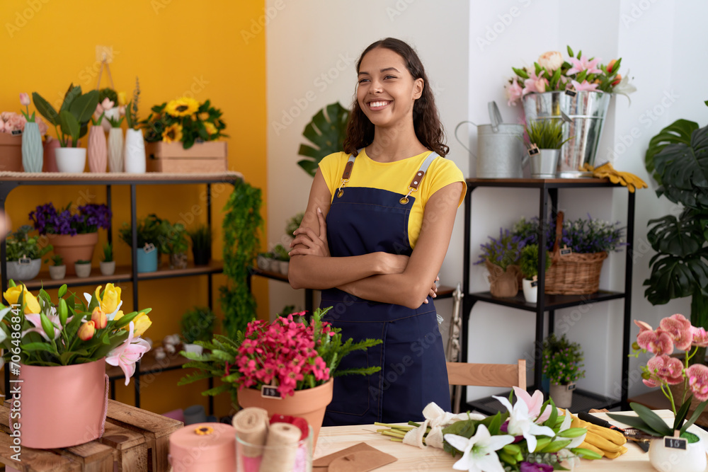 Young african american woman florist smiling confident standing with arms crossed gesture at flower shop Young african american woman florist smiling confident standing with arms crossed gesture at flower shop