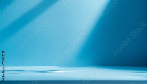 an abstract blue background with a subtle drop shadow  set against a light backdrop  to provide an elegant and modern setting for product presentation. 