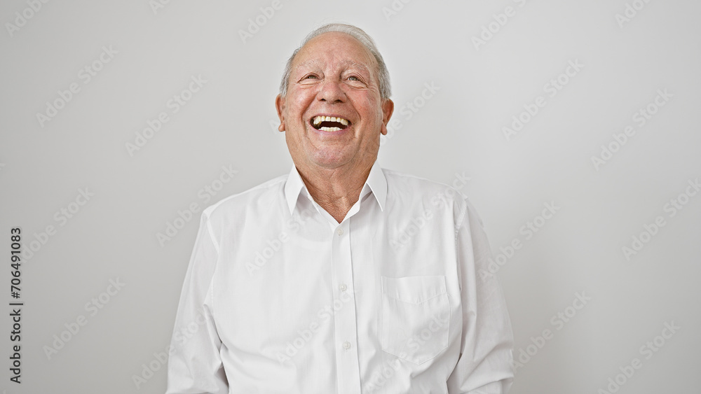 Casual snapshot of a cheerful, smiling senior man, full of confidence and joy, standing against an isolated white background, radiating happiness in his mature lifestyle. Casual snapshot of a cheerful, smiling senior man, full of confidence and joy, standing against an isolated white background, radiating happiness in his mature lifestyle.