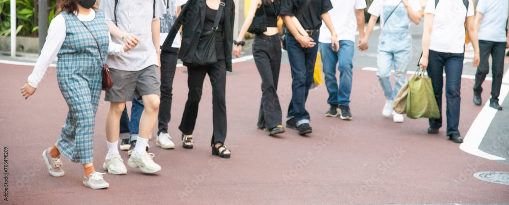 Fototapeta premium We walk down the street holding hands.