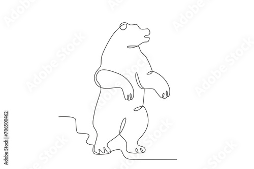 A bear stands on its hind legs. World Wildlife Day one-line drawing