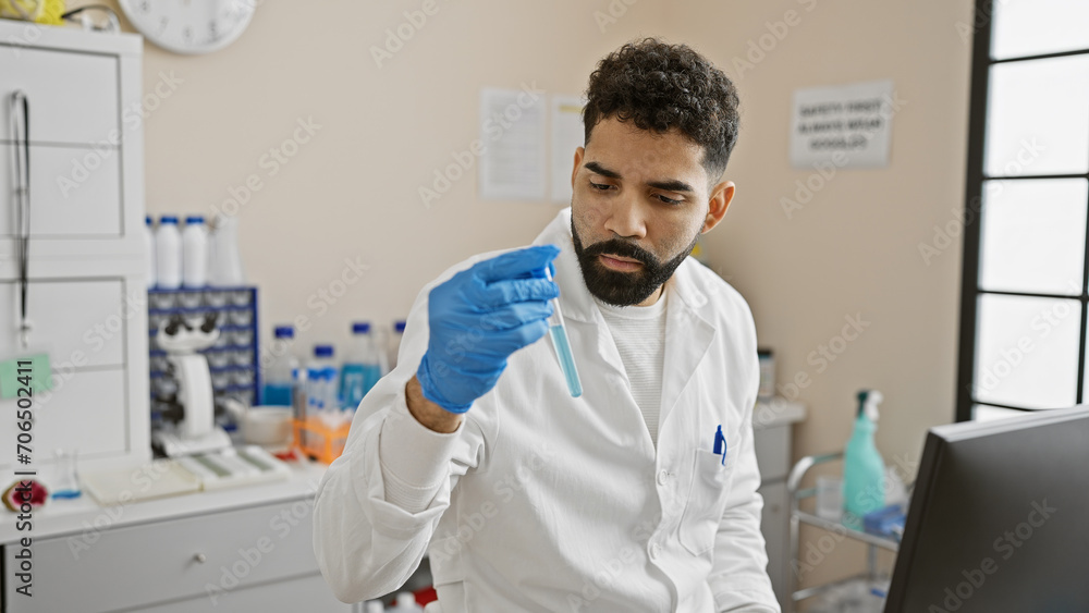 A focused latino man in a lab coat examines a test tube in a modern laboratory environment. A focused latino man in a lab coat examines a test tube in a modern laboratory environment.