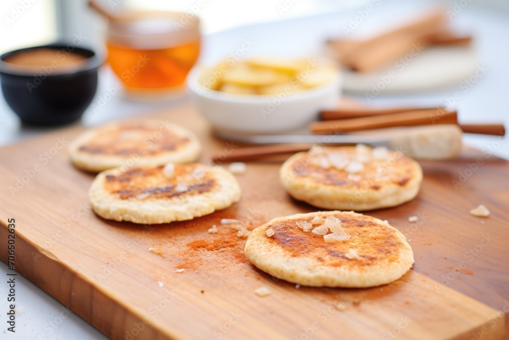 english muffin halves toasted with cinnamon sugar english muffin halves toasted with cinnamon sugar