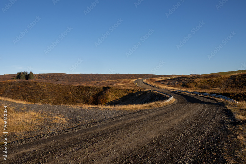 Gravel road cross the autumn fields, south Iceland Gravel road cross the autumn fields, south Iceland
