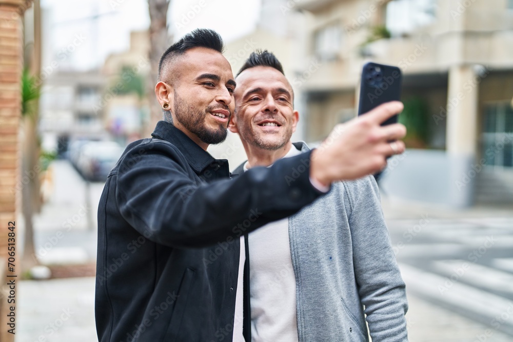Two men couple smiling confident make selfie by smartphone at street Two men couple smiling confident make selfie by smartphone at street