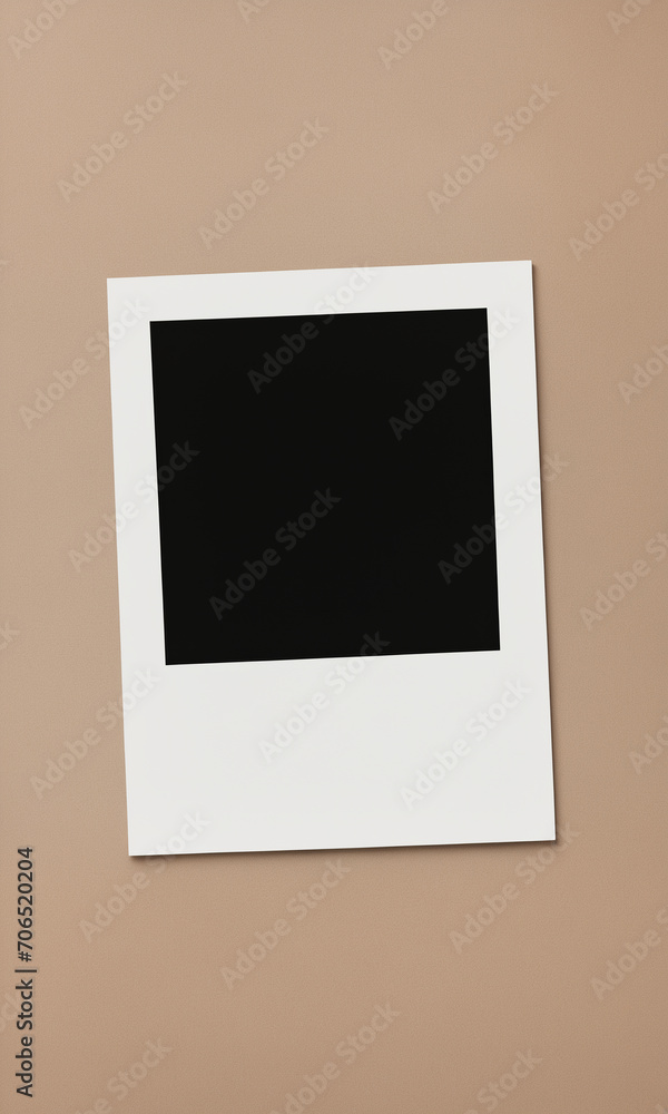Empty polaroid photo print against a simple bacgkground Empty polaroid photo print against a simple bacgkground