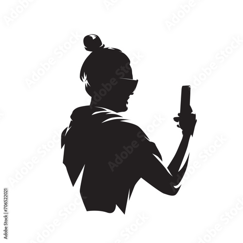 Woman with cell phone, isolated vector silhouette. Mobile phone in hand, selfie