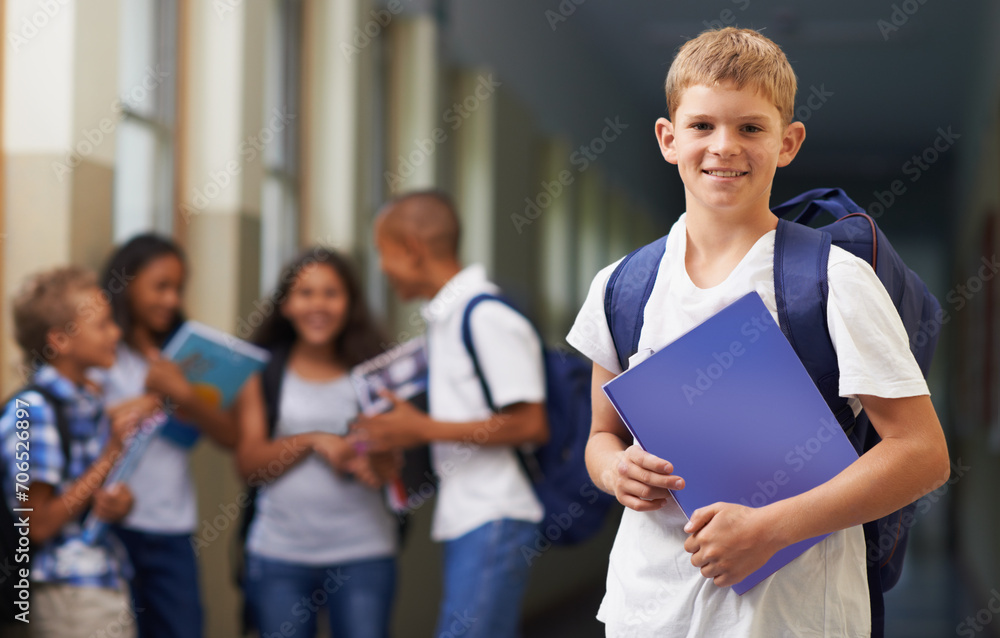 Boy, portrait and smile in corridor of school with backpack and books for learning, education or knowledge. Student, person and face with happy in building or hallway before class or ready to study Boy, portrait and smile in corridor of school with backpack and books for learning, education or knowledge. Student, person and face with happy in building or hallway before class or ready to study