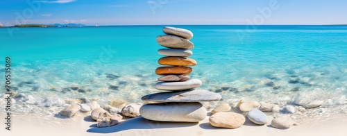 Stack of Rocks on Sandy Beach, Natures Simple Balance Displayed