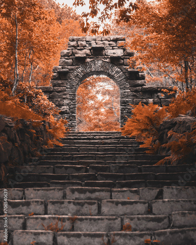 Old stone archway ruin with autumn trees, countryside forest ruins, historic England, magical fairytale, Rivington Pike