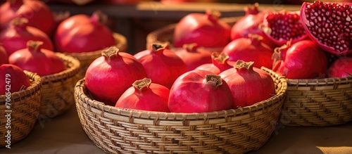 Pomegranate fruits in Madaba marketplace  Jordan  on straw plates.