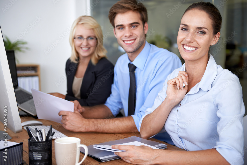 Fototapeta premium Portrait of happy business people at desk in coworking space with career in market research office. Team leader, professional employees and project manager with smile on face at planning workshop.
