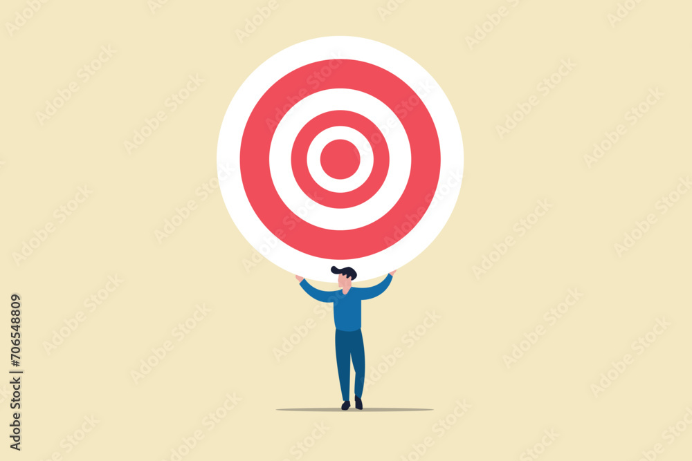 Businessman lifting a target. concept of Reach target or reach goal, success, achievement or growth, challenge and motivation Businessman lifting a target. concept of Reach target or reach goal, success, achievement or growth, challenge and motivation