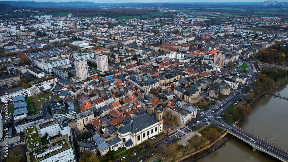 Aerial around the city Thionville in France on a sunny noon in later fall.