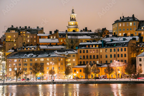 Photography Saint Maria Magdalena church, Stockholm Sweden, behind the cityscape of Sodermal