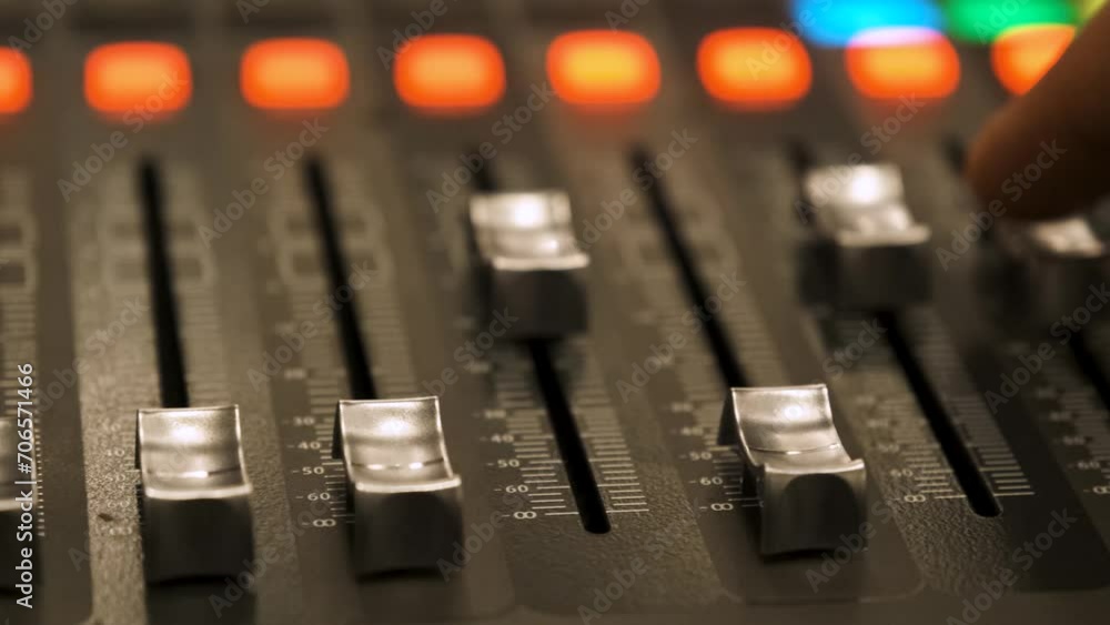 Working on a large sound mixer Working on a large sound mixer